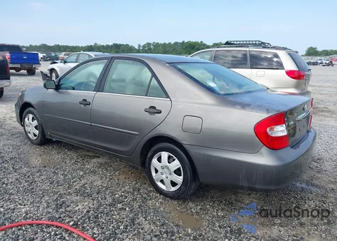 2003 Toyota Camry Le z USA, uszkodzony, nr VIN 4T1BE32K83U648057